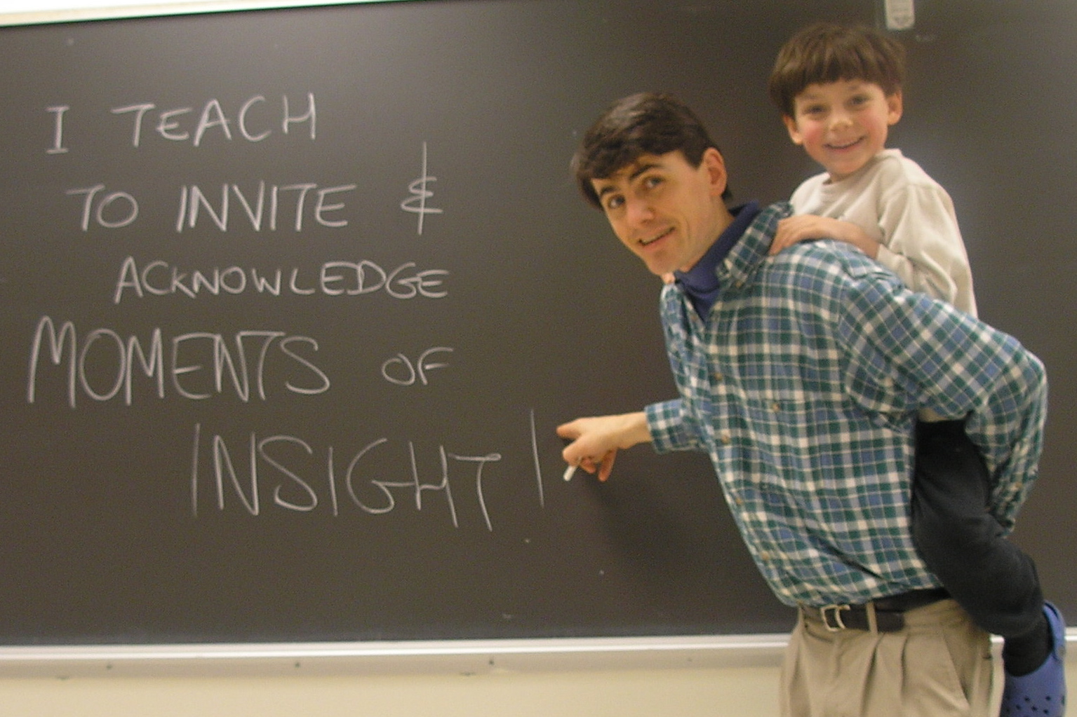 "why I teach" photo - professor at the blackboard